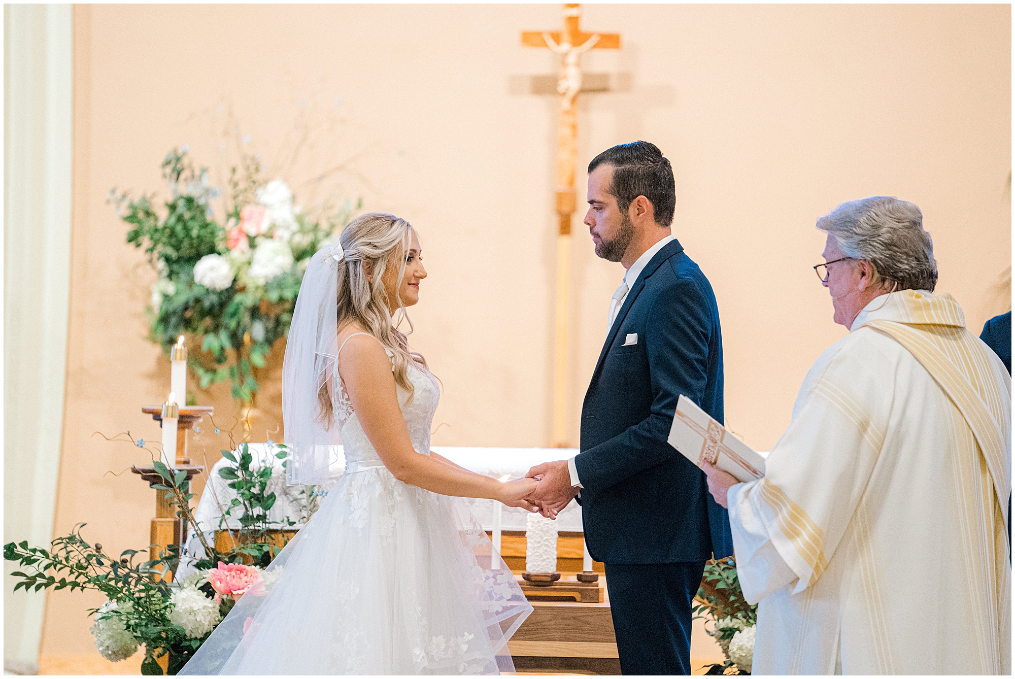 closeup of bride and groom at altar