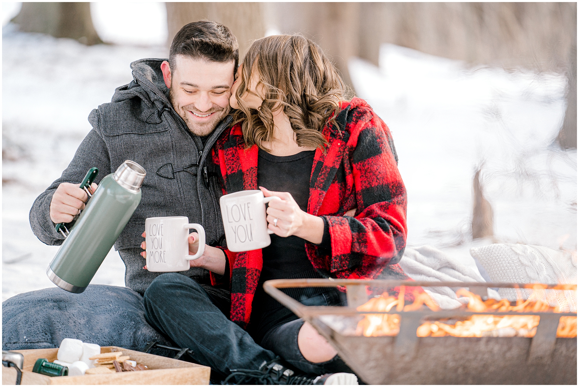 winter engagement photos drinking hot chocolate