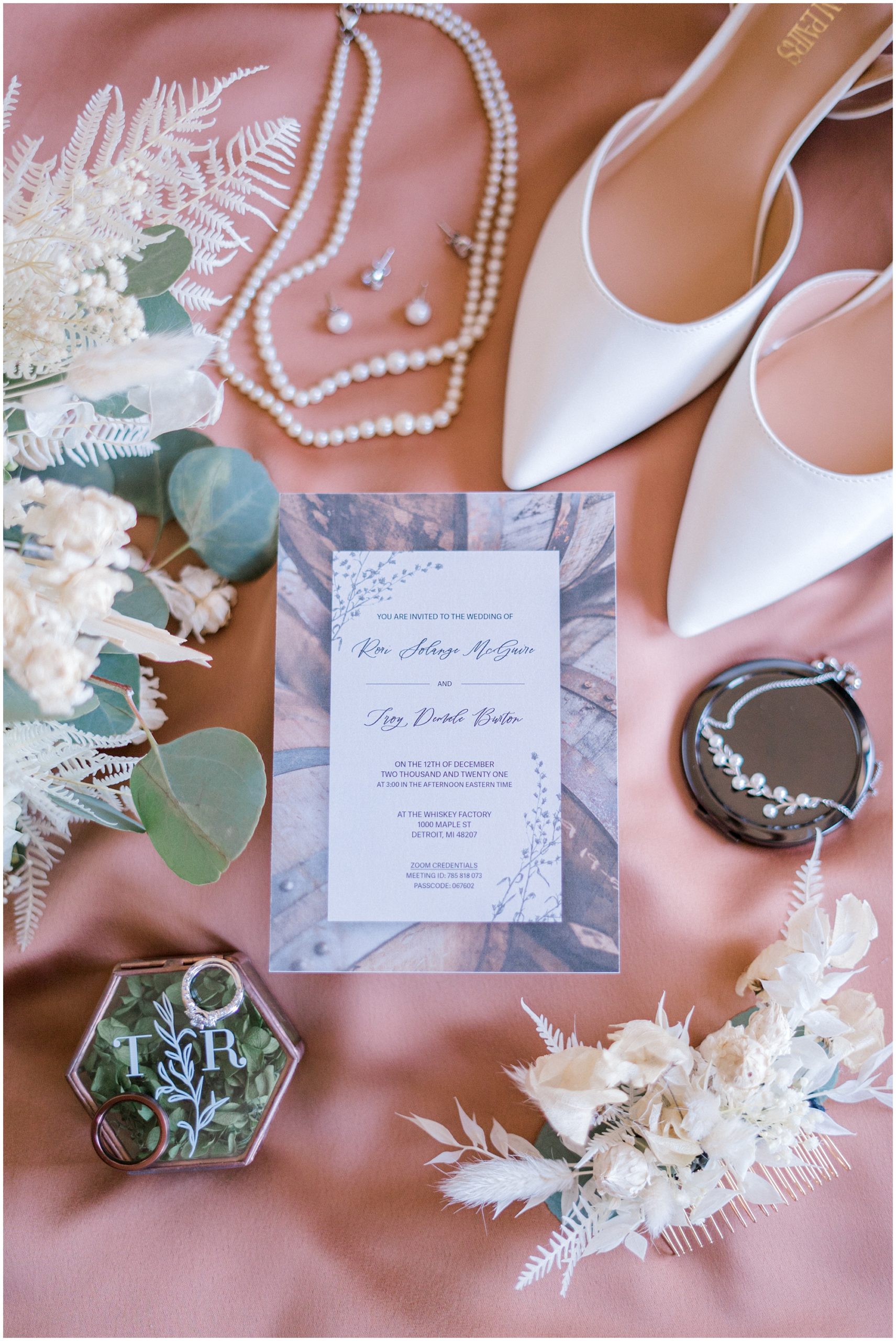 wedding invitation flat lay with tips for planning a wedding in 2023